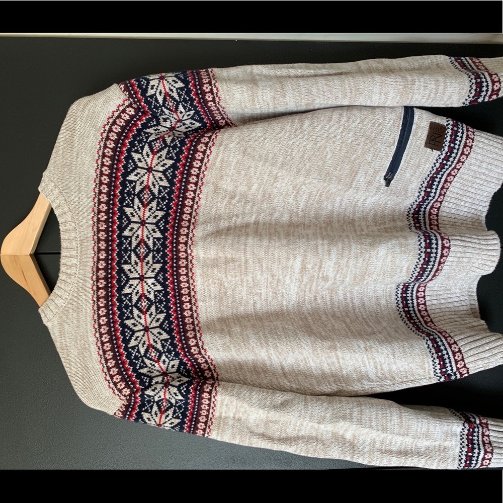 Sweater with zip pocket.